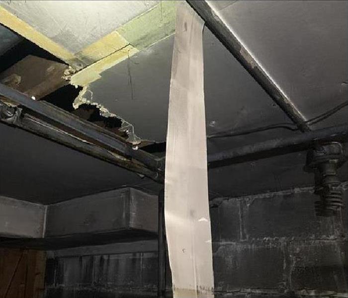 room covered in soot after a fire