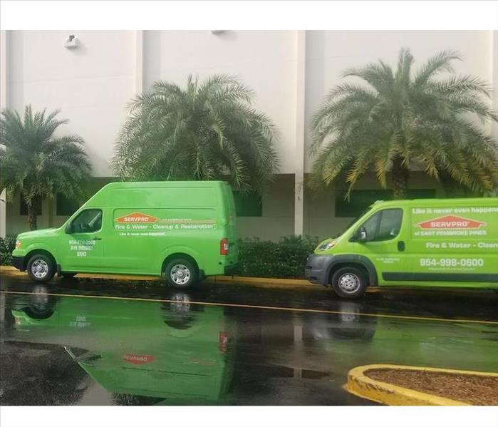 SERVPRO vehicles parked outside building